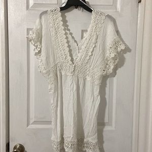 Gorgeous white coverup with crochet edges